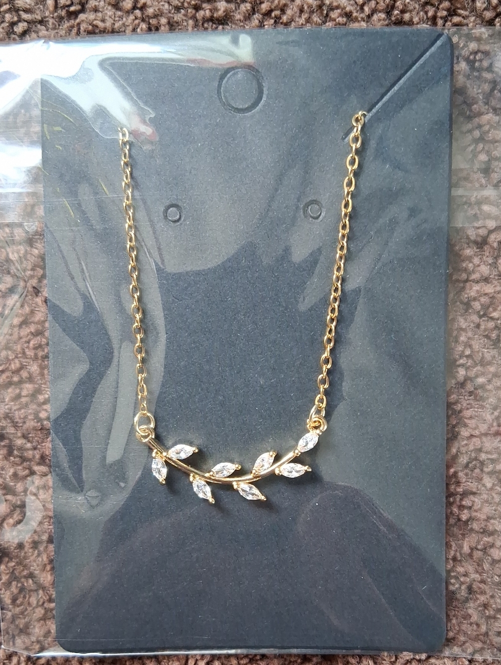 18 KT GOLD OVER STAINLESS with Cubic Zerconia. Wont Tarnish NWT